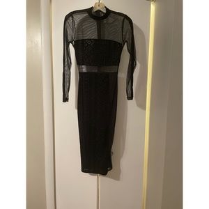 Gently used mesh/ velour fabric black dress! Perfect for New Year’s Eve!
